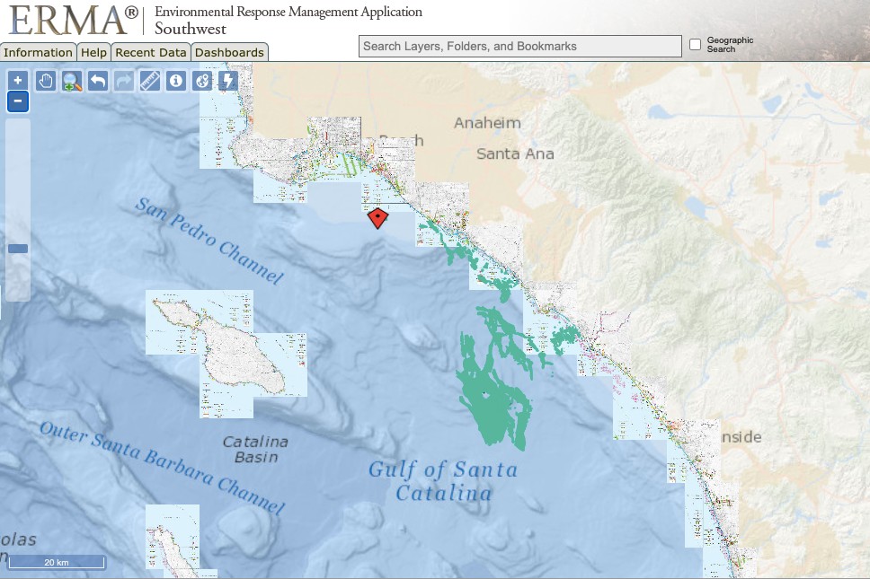 Map of the coast near Los Angeles showing a red kite where the oil spill happened and green patches to indicate the oil slick.