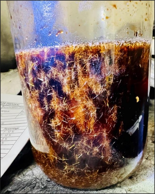 large jar of crystalized substance